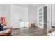 Bright home office with wood-look floors and two sets of doors at 12 E Quartz Rock Rd, Phoenix, AZ 85085