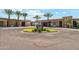 Community entrance with landscaping and art at 3059 E Rose Ln, Phoenix, AZ 85016