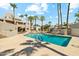 Inviting community pool with lounge chairs and mountain views at 3059 E Rose Ln, Phoenix, AZ 85016