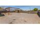 Backyard view showing gravel and wooden fence at 9424 N 2Nd Pl, Phoenix, AZ 85020