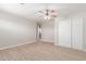 Spacious bedroom featuring laminate wood floor and mirrored closet doors at 9424 N 2Nd Pl, Phoenix, AZ 85020