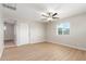 Bright bedroom featuring ceiling fan and ample natural light at 9424 N 2Nd Pl, Phoenix, AZ 85020