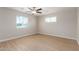 Spacious bedroom with light walls and wood-look flooring at 9424 N 2Nd Pl, Phoenix, AZ 85020
