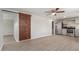 Modern kitchen featuring stainless steel appliances and a stylish barn door at 9424 N 2Nd Pl, Phoenix, AZ 85020