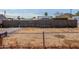 Vacant lot with wooden fence and mailbox, ideal for new construction at 9424 N 2Nd Pl, Phoenix, AZ 85020