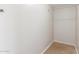 Large walk-in closet with neutral walls and carpeted flooring at 9424 N 2Nd Pl, Phoenix, AZ 85020