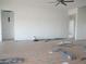 Large living room with ceiling fan and hardwood floors at 32278 N 168Th Ave, Surprise, AZ 85387