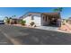 Mobile home exterior with carport and landscaping at 11596 W Sierra Dawn Blvd # 196, Surprise, AZ 85378