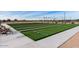 Well-maintained bocce ball courts with seating area nearby at 11596 W Sierra Dawn Blvd # 196, Surprise, AZ 85378