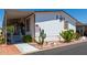 Nice single wide mobile home with covered porch and cacti at 11596 W Sierra Dawn Blvd # 196, Surprise, AZ 85378