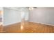 Living room with light walls, wood flooring, and a ceiling fan at 11596 W Sierra Dawn Blvd # 196, Surprise, AZ 85378