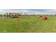 Dog park with shaded seating and play equipment at 11596 W Sierra Dawn Blvd # 196, Surprise, AZ 85378