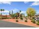 Landscaped community grounds with mature trees, pathways, and a relaxing atmosphere at 11596 W Sierra Dawn Blvd # 196, Surprise, AZ 85378