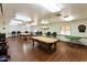Game room featuring two billiard tables, chairs, and a dartboard at 11596 W Sierra Dawn Blvd # 196, Surprise, AZ 85378