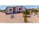 Mobile home with a large cactus and patio area at 11596 W Sierra Dawn Blvd # 196, Surprise, AZ 85378