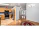 Open kitchen with stainless steel appliances and a view into the adjacent dining area at 11596 W Sierra Dawn Blvd # 196, Surprise, AZ 85378