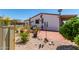 Spacious patio with seating area, fountain, and landscaping at 11596 W Sierra Dawn Blvd # 196, Surprise, AZ 85378