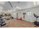 Fitness center with treadmills, elliptical machines, and weights at 11596 W Sierra Dawn Blvd # 196, Surprise, AZ 85378