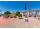 Red tile patio with seating and desert landscaping at 11596 W Sierra Dawn Blvd # 196, Surprise, AZ 85378