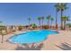 Community pool with a relaxing patio area at 11596 W Sierra Dawn Blvd # 196, Surprise, AZ 85378