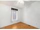 Light and airy bedroom with wood flooring and window at 11596 W Sierra Dawn Blvd # 196, Surprise, AZ 85378