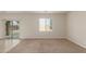 Spacious Gathering room with sliding door to backyard at 33025 N Mildred Ln, San Tan Valley, AZ 85144