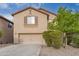 Two-story house with attached garage and landscaping at 33025 N Mildred Ln, San Tan Valley, AZ 85144
