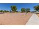 Sand volleyball court with net and surrounding trees at 33025 N Mildred Ln, San Tan Valley, AZ 85144