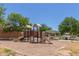 Community playground with shaded seating area at 33025 N Mildred Ln, San Tan Valley, AZ 85144
