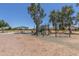 Community playground with play structures, slides, and shaded seating at 33025 N Mildred Ln, San Tan Valley, AZ 85144