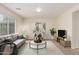 Virtually staged living room with modern furniture at 33025 N Mildred Ln, San Tan Valley, AZ 85144