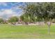 Green grassy park area with playground and benches at 33025 N Mildred Ln, San Tan Valley, AZ 85144