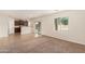 Kitchen features a breakfast bar and access to backyard at 33025 N Mildred Ln, San Tan Valley, AZ 85144