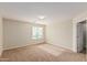 Bright bedroom with neutral walls and carpet at 33025 N Mildred Ln, San Tan Valley, AZ 85144