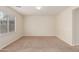 Empty dining room with neutral walls and carpet at 33025 N Mildred Ln, San Tan Valley, AZ 85144