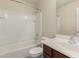 Bathroom with a shower, tub, and a brown vanity at 33025 N Mildred Ln, San Tan Valley, AZ 85144
