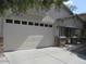 Two-car garage with attached carport at 43624 W Bailey Dr, Maricopa, AZ 85138