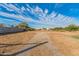 Empty lot with gravel and sparse vegetation at 1112 N Center St, Mesa, AZ 85201