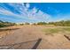 Vacant lot with gravel and some grass at 1112 N Center St, Mesa, AZ 85201