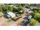Aerial view showcasing property, buildings, and vehicles at 1112 N Center St, Mesa, AZ 85201