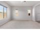 Simple bedroom with neutral walls and carpet flooring at 26496 W Lone Cactus Dr, Buckeye, AZ 85396
