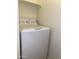 White washer and dryer in a laundry closet at 1701 E Colter St # 472, Phoenix, AZ 85016