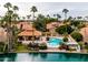 Aerial view of community pool and lakefront property at 617 S Paradise Dr, Gilbert, AZ 85233