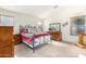 Cozy bedroom with a comfortable bed and plenty of natural light at 2420 W Blue Sky Dr, Phoenix, AZ 85085