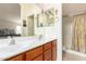 Clean bathroom with double sinks and a shower at 2420 W Blue Sky Dr, Phoenix, AZ 85085