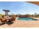Stunning pool and spa with seating and outdoor dining at 8157 E Sierra Morena St, Mesa, AZ 85207