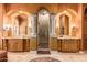 Spa-like bathroom with and vanities and a large shower at 8157 E Sierra Morena St, Mesa, AZ 85207