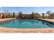 Inviting backyard pool with stonework and a spa at 8157 E Sierra Morena St, Mesa, AZ 85207