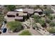 Luxury estate home with a circular driveway, a large pool, and a stunning desert landscape at 8157 E Sierra Morena St, Mesa, AZ 85207