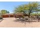 Impressive home with a three-car garage and a spacious, landscaped front yard at 8157 E Sierra Morena St, Mesa, AZ 85207